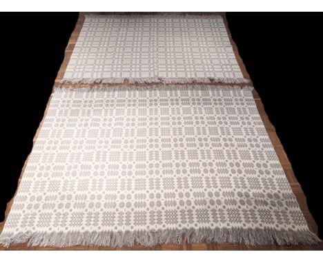 A pair of large Welsh tapestry blankets, grey and cream ground, each 240cm x 160cm
