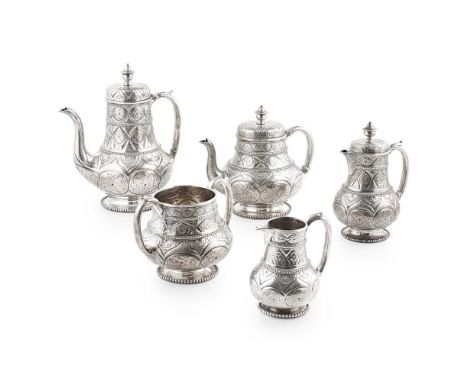 Y A Victorian matched five-piece tea and coffee service Hunt and Roskell, London 1861/2, comprising a coffee pot, teapot, hot