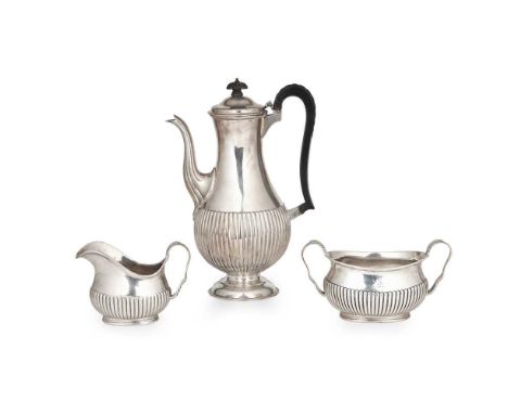 A Victorian coffee pot, sugar, and cream jug  Army &amp; Navy Cooperative Society Ltd, London 1887, each of demi-fluted balus