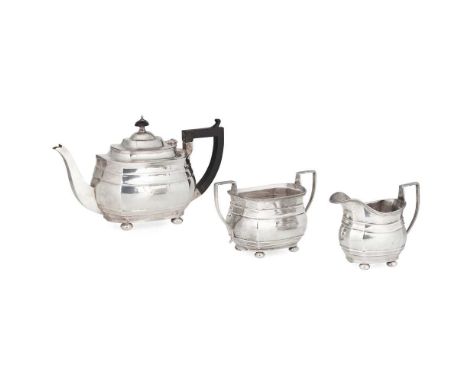 A George V three-piece tea service S Blanckensee &amp; Son Ltd, Birmingham 1919, comprising a teapot, twin-handled sugar basi