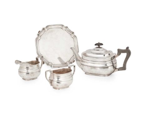 A matched George V three-piece tea service   Goldsmiths &amp; Silversmiths Co Ltd, Sheffield 1919/1922, comprising a teapot, 