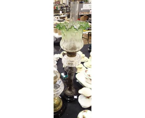 Victorian brass oil lamp with shade in green glass and funnel  CONDITION REPORT: Possibly not the original glass chimney for 