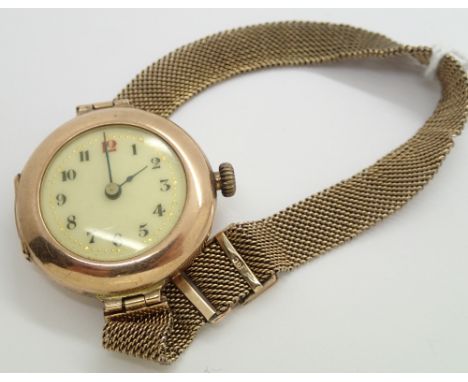 9ct gold wristwatch with 9ct gold mesh bracelet total weight 25.2g  CONDITION REPORT: This item is not running. 