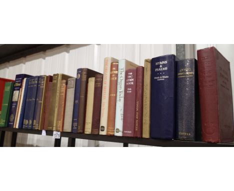 Shelf of music related books including Hymns and Psalms