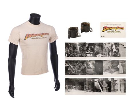 INDIANA JONES AND THE TEMPLE OF DOOM (1984) - Shackles, Photographs, Screening Invite and Crew T-shirtShackles and ephemera f