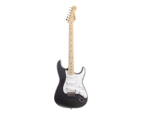 ERIC CLAPTON - Eric Clapton-autographed Fender Stratocaster GuitarA six-string Fender Stratocaster electric guitar signed by 
