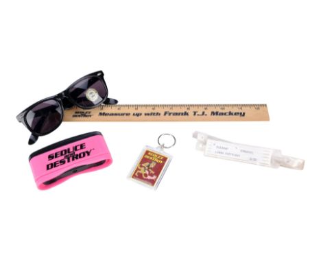 MAGNOLIA (1999) - Frank T.J. Mackey's (Tom Cruise) Seminar Swag with Linda Partridge's (Julianne Moore) Hospital BandSeminar 