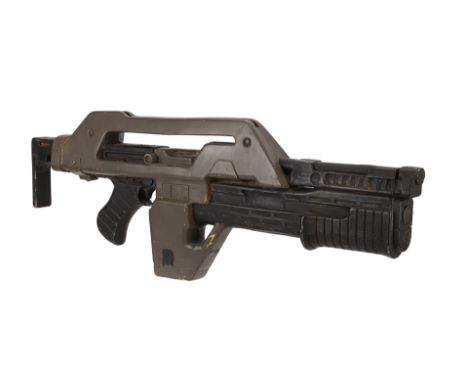 ALIENS (1986) - M41A Pulse RifleAn M41A Pulse Rifle from James Cameron's action sci-fi sequel Aliens. Pulse Rifles were used 