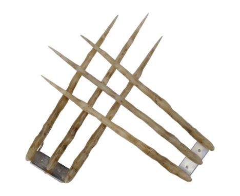 X-MEN ORIGINS: WOLVERINE (2009) - Wolverine's (Hugh Jackman) Bone ClawsWolverine's (Hugh Jackman) bone claws from Gavin Hood'