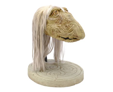 THE DARK CRYSTAL (1982) - Mystic Puppet Head on DisplayA Mystic puppet head from Jim Henson and Frank Oz's The Dark Crystal o