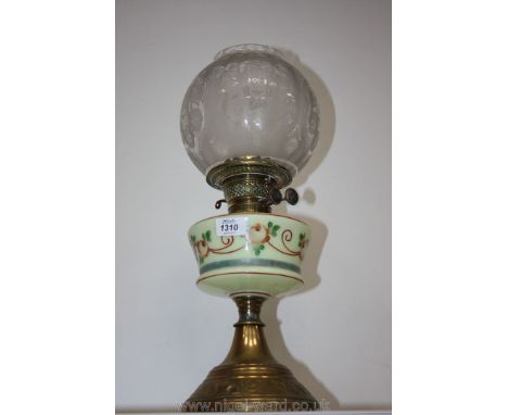 A brass Oil Lamp with opaque glass reservoir and etched glass shade