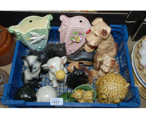 A quantity of Sylvac china animals including elephant salt and pepper, dogs, bear, two cats, two kittens in a boot, two wall 
