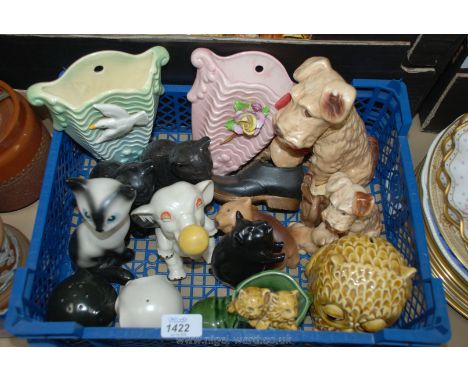 A quantity of Sylvac china animals including elephant salt and pepper, dogs, bear, two cats, two kittens in a boot, two wall 