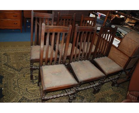 A set of Six Edwardian Oak Dining Chairs, reeded four slat backs, floral tapestry drop in seats, on bobbin turned legs with b