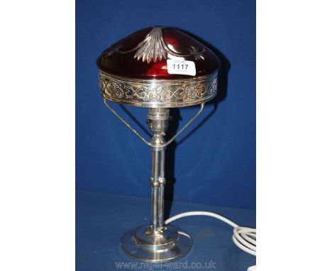 An Art Nouveau silver plated Table Lamp by WMF with a round stepped base and tri-column centre.  The circular gallery decorat