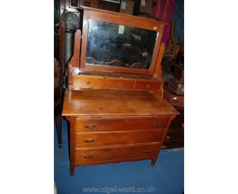 A circa 1900 satinwood Dressing Chest; rectangular bevel plated mirrors in flat supports with shelf and three small drawers, 