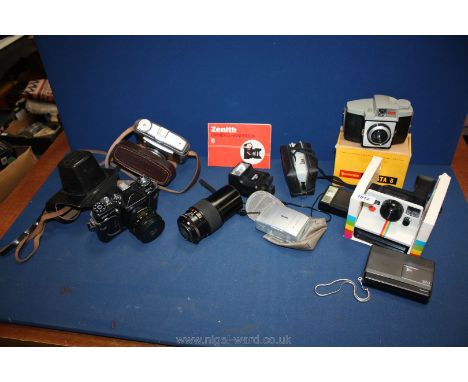 A quantity of cameras and accessories including a boxed Zenith EM 35mm SLR camera with 58 mm f/2 lens, an Ilford Sporti camer