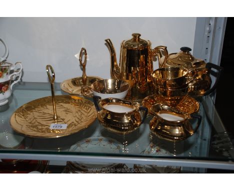 A quantity of gold lustre china including cake plate, teapot, teacups etc