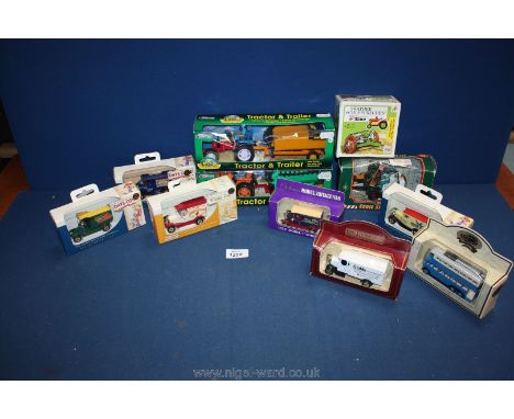 A quantity of boxed vehicles including Eddie Stobart fork lift, tractors and trailers, Days Gone van, Webbs of Crickhowell va