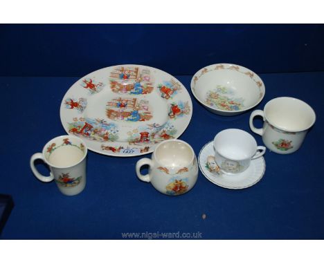 A Royal Doulton Bunnykins cup and bowl, a Bunnykins mug by Barbara Vernon, a fine bone china Humpty Dumpty cup and saucer and
