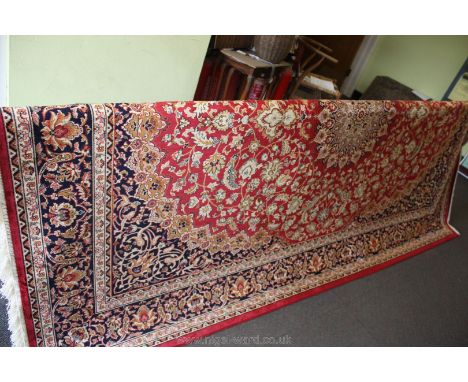 A red ground Keshan Carpet, 2.8 m x 2 m.