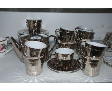 A quantity of Royal Worcester silver lustre ware including tea and coffee cups, teapot, side plates, etc