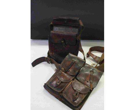 A vintage leather pouch with four compartments and a vintage leather cartridge pouch (2) 