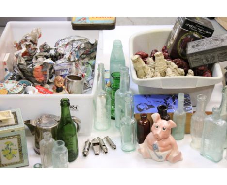 A group of mixed collectables to include antique bottles, Wade piggy babk, vintage advertising tin boxes and whistles.