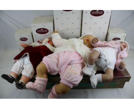 A collection of contemporary collectors dolls together with a vintage Crolly Doll.