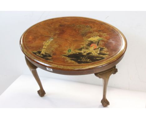 1920's Walnut Oval Coffee Table, with chinoiserie lacquered decoration to top, raised on cabriole legs with ball and claw fee