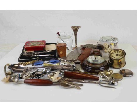 A box of mixed collectables to include wall barometer, vintage glasses and sunglasses, nut crackers, clock and napkin ring. 