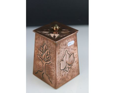 An early 20th century copper Arts And Crafts lidded caddy style pot decorated with stylized trees and leaves unsigned. 15 cm 