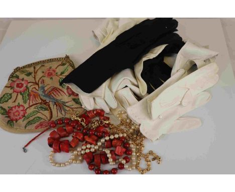 A group of mixed collectables to include a group of ladies vintage gloves, costume jewellery and a vintage clutch bag. 