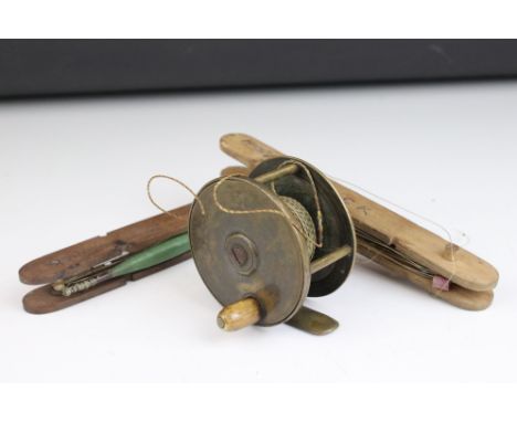 A vintage brass reel, 2 7/8", with horn handle enscribed 'Jack', plus two of Jack's hand lines
