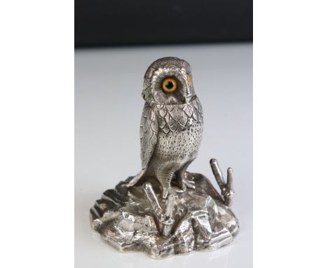 An Early 20th Century cast silver plated novelty inkwell in the form of a perching owl with hinged head and branched pen rest