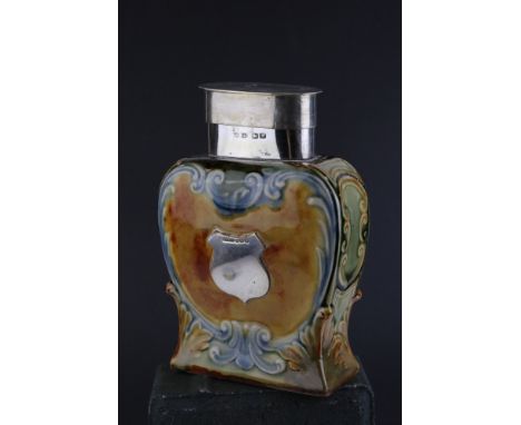 A Doulton Lambeth stoneware tea caddy embossed Honest Tea Is The Best Policy silver mounted Cornelius Saunders ( the lid is m
