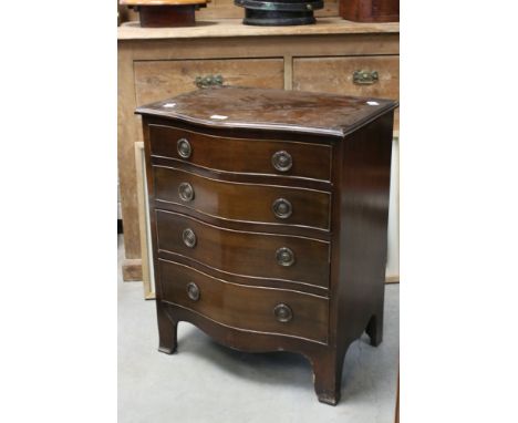 Small Mahogany Serpentine Front Chest of Four Drawers, with ring handles, raised on swept feet, 77cms high x 61cms wide 