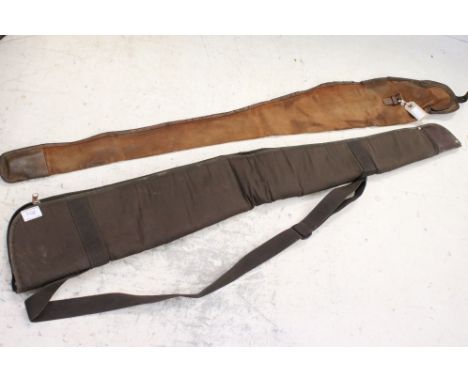 A canvas shotgun sleeve and a vintage canvas shotgun sleeve (2) 