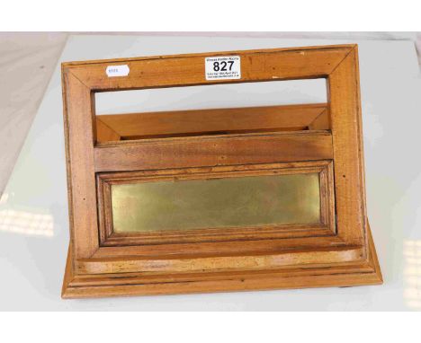 A vintage wooden and brass freestanding adjustable bookstand. 