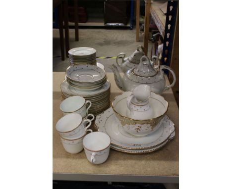 Victorian Part Tea Service, white ground with a gilt star pattern, comprising Tea Pot, Lidded Sugar Bowl, Two Bread Plates, F