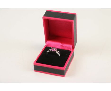A ruby and diamond ring 