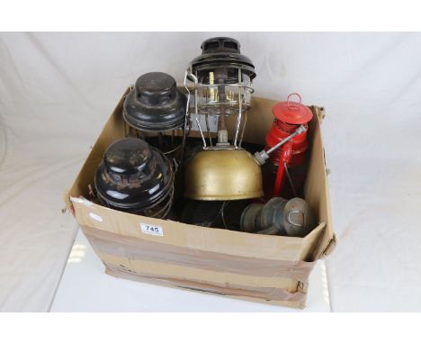 A quantity of vintage Hurricane lamps. 