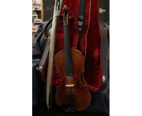 Violin with label to inside ' Antonius Stradivarius Cremonenfis, Faciebat Anno 1743 ' together with a Bow, contained in a fau