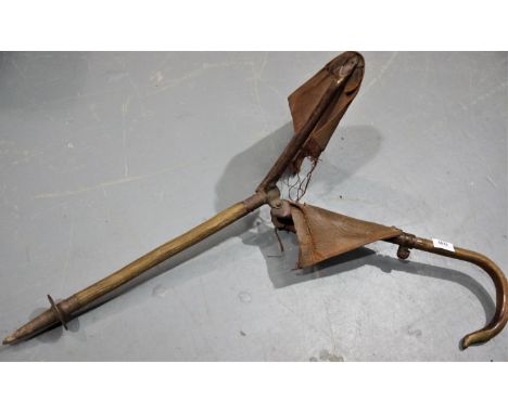 Early Grundigs leather shooting stick. P&amp;P Group 3 (£25+VAT) 