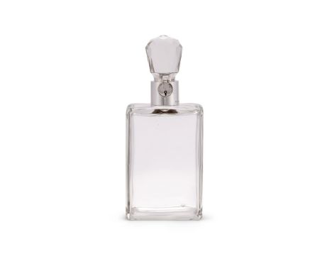 A medium silver mounted lockable glass decanter and stopper by Hukin & Heath Ltd, Birmingham 1936, the hasp fitting into the 