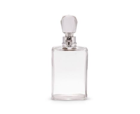 A medium silver mounted lockable glass decanter and stopper by Hukin & Heath Ltd, Birmingham 1911, the clasp with an associat