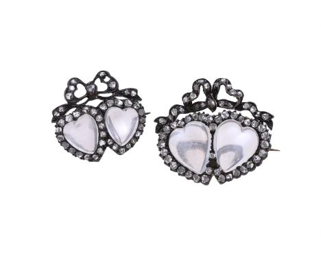 A pair of Victorian moonstone and diamond double heart brooches, circa 1880, the brooches both set with a pair of polished ca