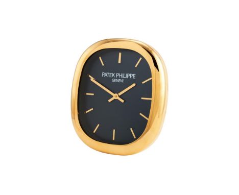 Patek Philippe, Ellipse, a gilt brass wall clock, circa 1990, quartz movement, blue dial, applied baton markers, pointed bato