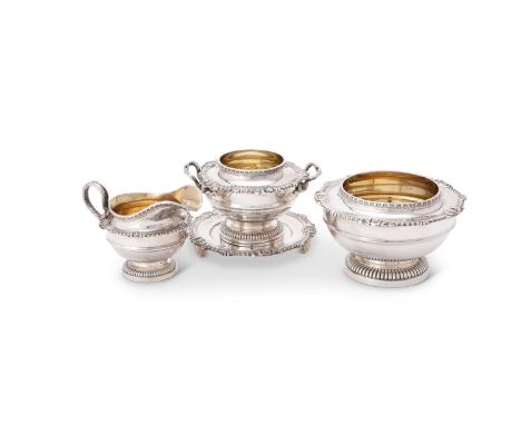 Four pieces from a silver circular pedestal tea service by James Dixon & Sons Ltd, Sheffield 1926-30, in the manner of Paul S