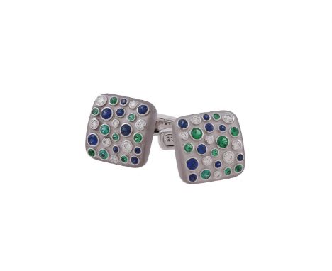 A pair of diamond, sapphire and emerald cufflinks by William & Son, the matt white gold panels set with circular cut sapphire